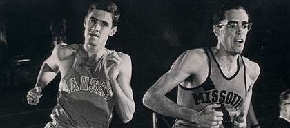 Kansas runner Jim Ryun, left, attempts to pass Missouri’s Glenn Ogden in this file photo. Ryun was the first high schooler to run a sub-four-minute mile. The distance isn’t run often at the high school level anymore.