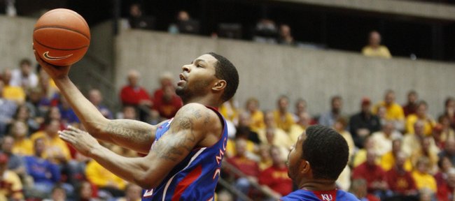Kansas forward Marcus Morris gets a bucket as he's fouled by Iowa State forward Melvin Ejim during the first half on Wednesday, Jan. 12, 2011 at Hilton Coliseum in Ames, Iowa.