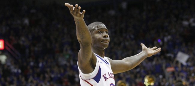 Josh Selby looks to the crowd after a KU score during the first half of the Jayhawks' game against the Kansas State Wildcats, Saturday, Jan. 29, 2011 at Allen Fieldhouse. KU defeated KSU 90-66. 