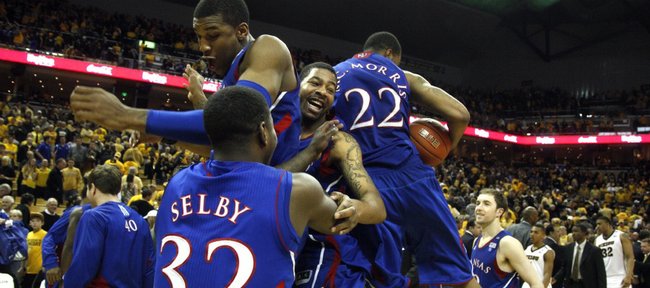 Kansas players Josh Selby, Thomas Robinson, Markieff Morris and Marcus Morris (22) collide in celebration on the court after defeating Missouri 70-66 and clinching the outright Big 12 conference championship Saturday, March 5, 2011 at Mizzou Arena.