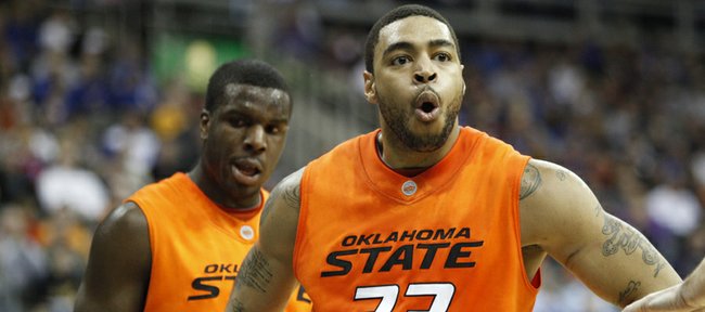 Oklahoma State forward Marshall Moses protests a foul during the first half on Thursday, March 10, 2011 at the Sprint Center in Kansas City.