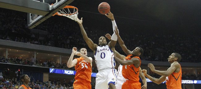 Kansas forward Thomas Robinson battles inside for a rebound with the Illinois defense during the first half on Sunday, March 20, 2011 at the BOK Center in Tulsa.