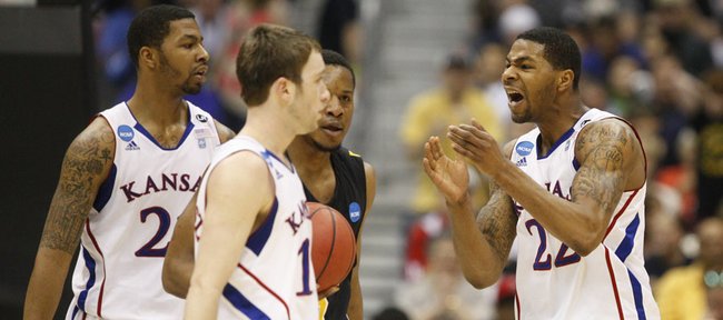 Kansas forward Marcus Morris pleads to Markieff Morris and Brady Morningstar to get it together against Virginia Commonwealth during the first half on Sunday, March 27, 2011 at the Alamodome in San Antonio.