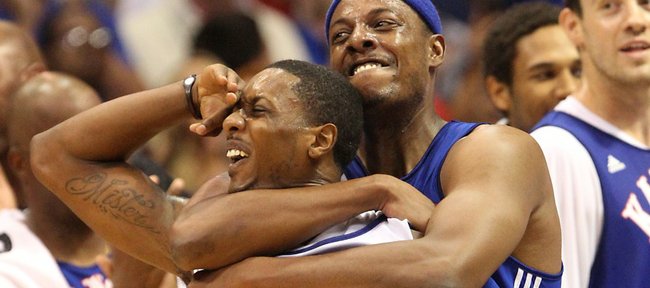 Paul Pierce jokes with Mario Chalmers after Chalmers hit the Legends of the Phog scrimmage's game-tying shot at the buzzer Saturday, Sept. 24, 2011 at Allen Fieldhouse.