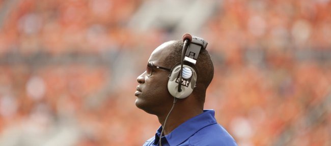 Kansas head coach Turner Gill watches from the sidelines during the second quarter against Oklahoma State on Saturday, Oct. 8, 2011 at Boone Pickens Stadium.