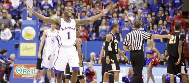 Kansas guard Naadir Tharpe raises up the Fieldhouse during a run by the Jayhawks against Fort Hays State during the second half on Tuesday, Nov. 8, 2011 at Allen Fieldhouse.