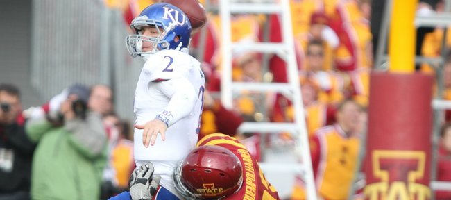 Kansas quarterback Jordan Webb is sacked on a crucial third down by Iowa State defensive lineman Stephen Ruempolhamer forcing the Jayhawks to punt late in the fourth quarter on Saturday, Nov. 5, 2011 at Jack Trice Stadium in Ames, Iowa. The Jayhawks lost to the Cyclones 13-10.