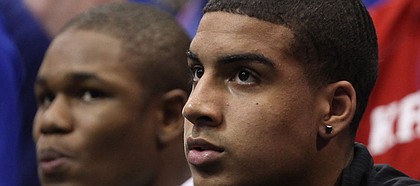Kansas recruit Landen Lucas watches the action during the second half on Friday, Nov. 11, 2011 at Allen Fieldhouse.