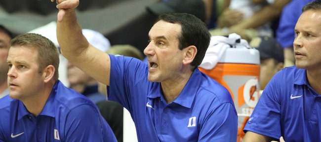Duke head coach Mike Krzyzewski calls a play from the bench during the second half against Michigan on Tuesday, Nov. 22, 2011 at the Lahaina Civic Center.