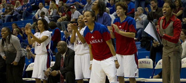 Angel Goodrich and the rest of the Kansas bench cheer late in the game during Kansas’ game against Lamar in the Basketball Travelers Classic Friday, Nov. 25, 2011 at Allen Fieldhouse. 