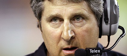 n this Sept. 19, 2009, file photo, Texas Tech coach Mike Leach waits as a play is reviewed against Texas in Austin, Texas. Leach has reached a verbal agreement to be the new football coach at Washington State, an official within the athletic department told the Associated Press on Wednesday, Nov. 30, 2011.