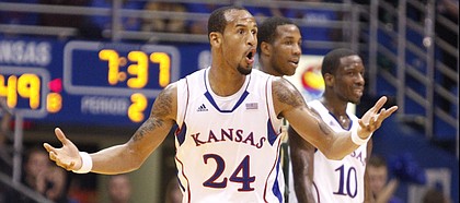 Kansas guard Travis Releford disputes a call with an official during the second half on Saturday, Dec. 3, 2011 at Allen Fieldhouse.