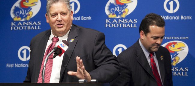 Charlie Weis makes an opening statement after being introduced by Kansas University athletic director Sheahon Zenger during a news conference Friday in which Weis was announced as the new head football coach.