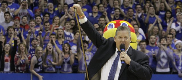 Newly appointed Kansas University head football coach Charlie Weis is introduced at halftime of KU's men's basketball game against Ohio State on Saturday, Dec. 10, 2011 at Allen Fieldhouse.