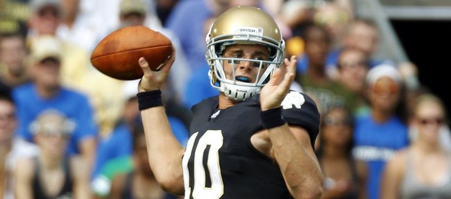 In this Sept. 3, 2011, file photo, Notre Dame quarterback Dayne Crist throws against South Florida in South Bend, Ind.