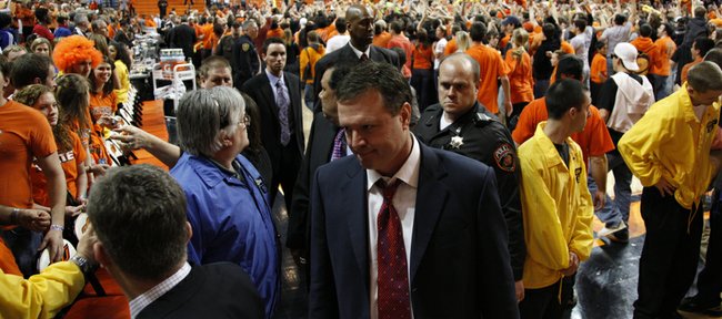 Kansas head coach Bill Self leaves the court following the Jayhawks' 85-77 loss to Oklahoma State, Saturday, Feb. 27, 2010 at Gallagher-Iba Arena in Stillwater.