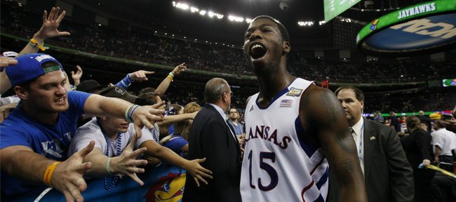 Kansas guard Elijah Johnson takes in the roar of the crowd as he leaves the floor following the Jayhawks' 64-62 win over Ohio State on Saturday, March 31, 2012 at the Superdome.