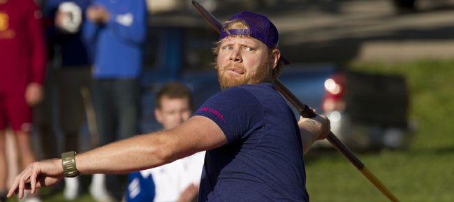 Former Kansas University standout Scott Russell competes in the javelin event at the Kansas Relays Friday, April 20, 2012.