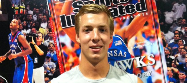 Kansas freshman Zach Peters poses for a photo inside Allen Fieldhouse.