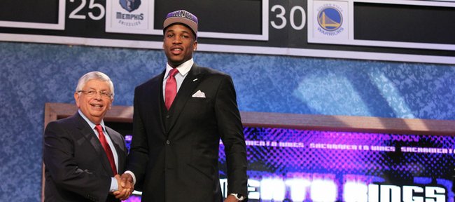 Former Kansas forward Thomas Robinson, right, shakes the hand of NBA commissioner David Stern after Robinson was selected with the fifth pick in the NBA Draft on Thursday in Newark, N.J.