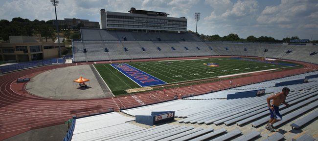 The renovation of Memorial Stadium and removal of the track that surrounds its field — seen here on Wednesday, July 12, 2012 — are projects many in the Kansas University football community would welcome. KU officials continue to explore their options regarding a stadium face-lift, but KU athletic director Sheahon Zenger said any plans are on hold until a new home is found for the Jayhawk track and field programs.