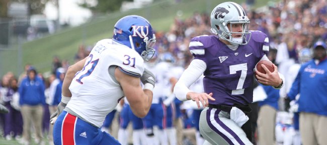 Kansas State quarterback Collin Klein escapes linebacker Ben Heeney for a carry during the third quarter on Saturday, Oct. 6, 2012 at Bill Snyder Family Stadium in Manhattan. 