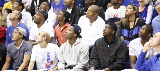 Wayne Selden, middle front row, sits behind the bench during Late Night in the Phog on Friday, Oct. 12, 2012 at Allen Fieldhouse. Selden was one of 24 players selected for the 2013 McDonald's All-American game.