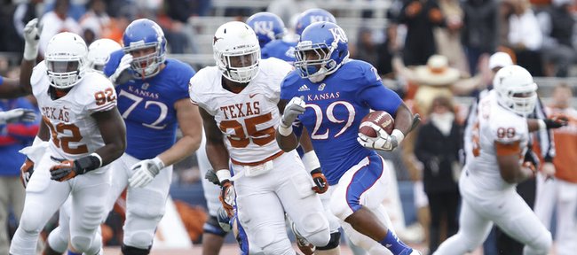 Kansas running back James Sims blows past the Texas defense on a long run during the second quarter on Saturday, Oct. 27, 2012 at Memorial Stadium.