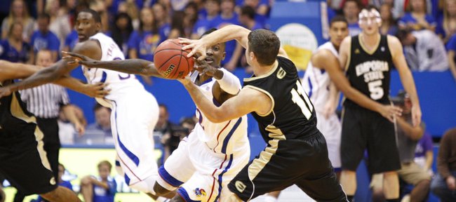 Kansas guard Rio Adams looks for a steal as he defends Emporia State guard Taylor Euler during the second half, Tuesday, Oct. 30, 2012 at Allen Fieldhouse.