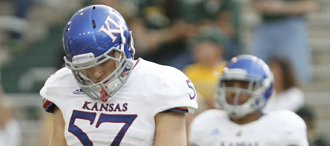 Kansas linebacker Jake Love hangs his head after a Baylor touchdown during the third quarter, Saturday, Nov. 3, 2012 at Floyd Casey Stadium in Waco, Texas.