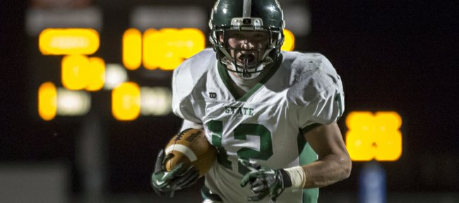 Free State's Joe Dineen finds some open space as he runs the ball against Leavenworth during their game Friday, Oct. 19, 2012 at Leavenworth.
