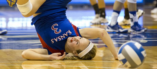 Kansas' Brianne Riley gets turned upside down as she is unable to make a dig during Kansas' second round NCAA tournament game against Wichita State, Saturday, Dec. 1, 2012 in Allen Fieldhouse. The Jayhawks fell, 3-1, and with the loss their season ended. 