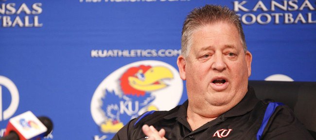 Kansas University football coach Charlie Weis discusses KU’s recently signed junior-college transfers at a news conference on Thursday, Dec. 20, 2012, at KU.