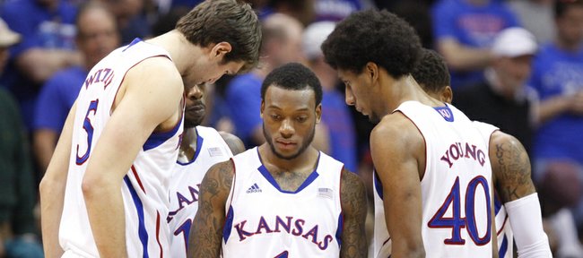 Kansas players come to a huddle while trailing Temple during the second half on Sunday, Jan. 6, 2013 at Allen Fieldhouse.