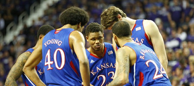 Kansas guard Ben McLemore, center, leans in as he and the Jayhawk starters huddle late in the game against Kansas State on Tuesday, Jan. 22, 2013 at Bramlage Coliseum.