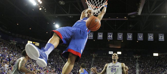 Kansas guard Travis Releford finishes a dunk against Kansas State during the second half on Tuesday, Jan. 22, 2013 at Bramlage Coliseum.