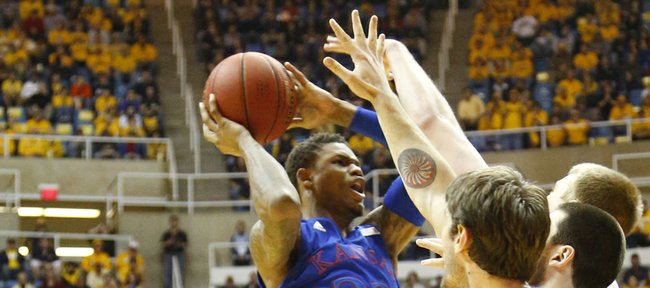 Ben McLemore leaps for  basket in the Jayhawks 61-56 win against the Mountaineers Monday night at West Virginia University.
