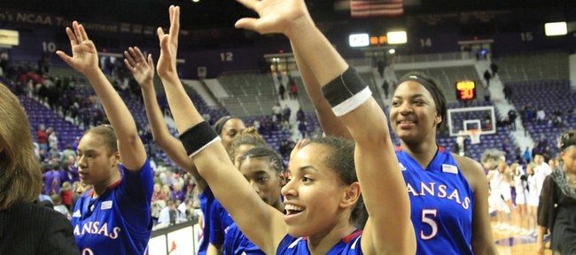 Kansas' Angel Goodrich (3) celebrates with KU fans after the Jayhawks' 89-80, double-overtime victory over Kansas State on Saturday, Feb. 2, 2013, in Manhattan.