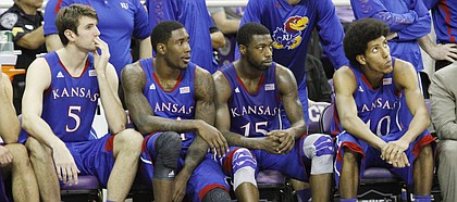 From left Jeff Withey, Jamari Traylor, Elijah Johnson and Kevin Young, watch the final seconds of the Jayhawks' 62-55 loss to Texas Christian on Feb. 6, 2013 in Fort Worth, Texas.