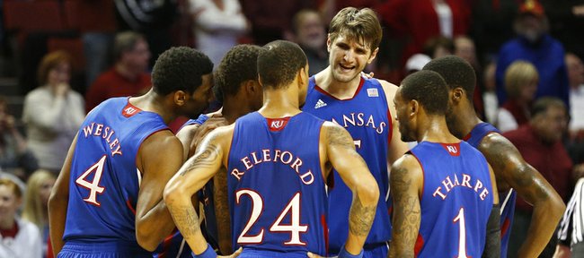 Kansas center Jeff Withey talks to his teammates with seconds left and the game out of reach on Saturday, Feb. 9, 2013 at Noble Center in Norman, Oklahoma.