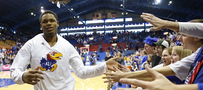 Kansas guard Ben McLemore slaps hands with KU fans following his 36-point effort, the most by a freshman since Danny Manning, following the Jayhawks' 91-65 win over West Virginia on Saturday, March 2, 2013 at Allen Fieldhouse.