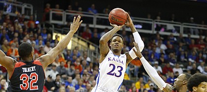 Kansas guard Ben McLemore puts up a three against Texas Tech during the first half of the second round of the Big 12 tournament on Thursday, March 14, 2013 at the Sprint Center in Kansas City, Missouri.
