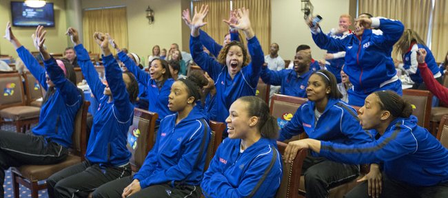 Members of the Kansas women's basketball team celebrate as they learn their fate in the 2013 NCAA Women's Tournament Monday evening at Allen Fieldhouse. The Jayhawks earned the 12th seed in the Norfolk region and will play fifth seeded Colorado at 5:30 p.m. on Saturday.