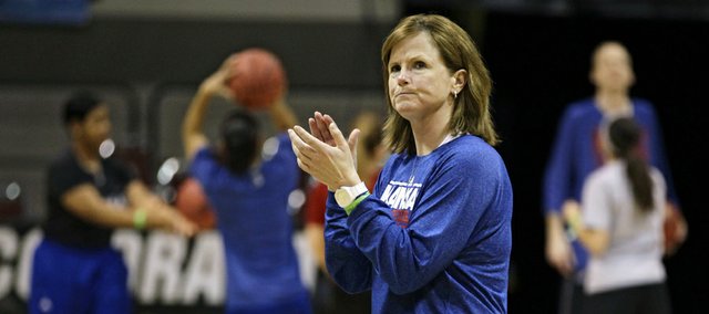 Kansas University women’s basketball coach Bonnie Henrickson directs her team during practice Friday, March 22, 2013, in Boulder, Colo. The Jayhawks will play Colorado in an NCAA Tournament game approximately 5:40 p.m. today in Boulder.