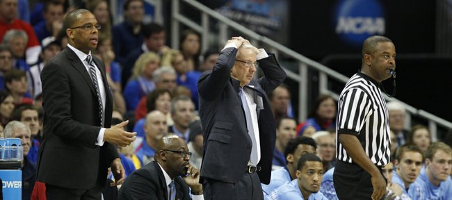 North Carolina head coach Roy Williams, center, puts his hands on his head during after a missed bucket by the Tar Heels in the second half, Sunday, March 24, 2013 at the Sprint Center in Kansas City, Mo.
