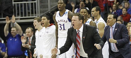 Kansas coach Bill Self cheers from the sidelines in the second-half of the Jayhawks 70-58 win against North Carolina Sunday, March 24, 2013 at the Sprint Center in Kansas City, Mo..