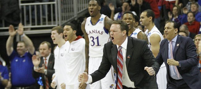 Kansas coach Bill Self cheers from the sidelines in the second-half of the Jayhawks 70-58 win against North Carolina Sunday, March 24, 2013 at the Sprint Center in Kansas City, Mo..