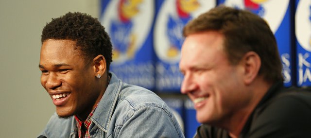Kansas guard Ben McLemore smiles next to head coach Bill Self after saying that he will miss Self during a news conference in which McLemore declared his intention to enter the 2013 NBA Draft. Nick Krug/Journal-World Photo