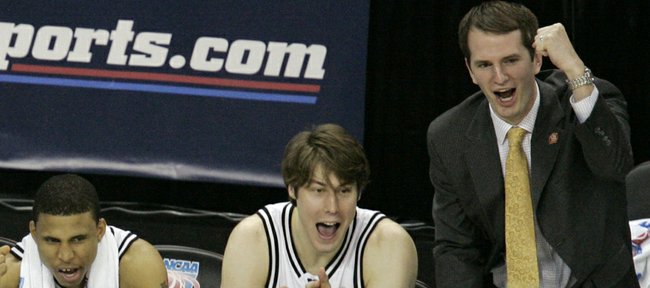 From left, Vanderbilt's Shan Foster, Dan Cage, Alex Gordon, Ted Skuchas and assistant coach Brad Frederick cheer from the bench in the closing moments of their game against George Washington University during the first round of the NCAA East Regional basketball tournament at Arco Arena in Sacramento, Calif., Thursday, March 15, 2007. Vanderbilt won the game, 77-44.