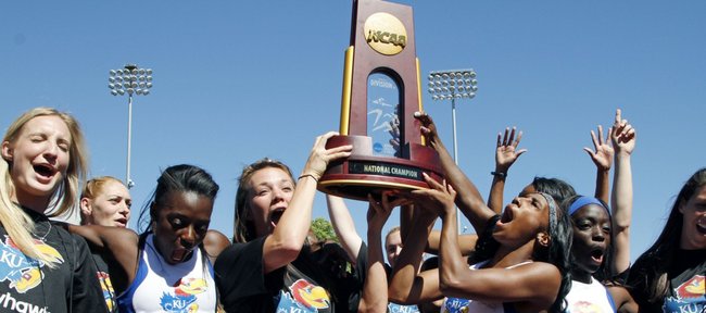 Kansas University's women's track team celebrates after winning the NCAA Outdoor track and field championships on Saturday in Eugene, Ore.